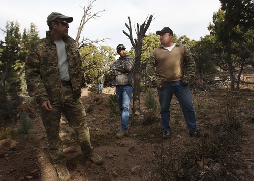 Leah Hogsten  |  The Salt Lake Tribune
l-r Rodney Holliday with DEA, Brian Lacy and Brian Bairett with the Iron, Garfield and Beaver County Narcotics Task Force stand in what once was a marijuana grove that once held more than 4,200 plants in Iron County, Thursday, November 1, 2012. Cooperation among federal agents, prosecutors and county sheriffs coupled with a drought have helped reduce the amount of marijuana grown in Utah primarily by the La Familia cartel from Michoacan, Mexico, the primary grower in Utah.