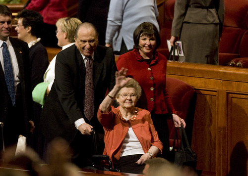 Kim Raff | The Salt Lake Tribune
LDS President Thomas S. Monson and his wife Frances Monson leave the morning session of the 183rd General Conference of the LDS Church in 2012.