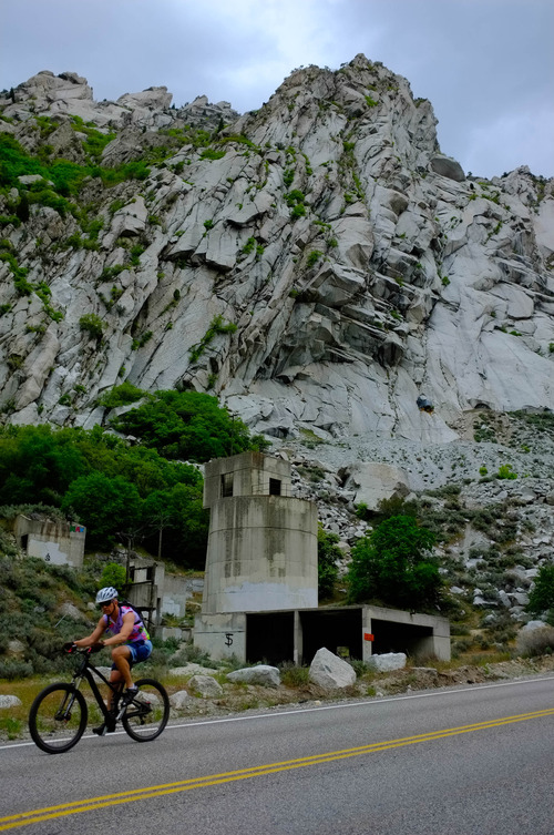 Trent Nelson  |  The Salt Lake Tribune
The Forest Service is seeking public comment on a plan to demolish the old Grit Mill less than a mile up Little Cottonwood Canyon to make a parking area for rock climbers. A cyclist rides by Thursday May 16, 2013.