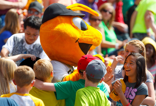 Trent Nelson  |  The Salt Lake Tribune
Bumble, mascot of the Salt Lake Bees, is surrounded by kids as the Bees take on the Memphis Redbirds, AAA baseball in Salt Lake City Tuesday May 21, 2013.