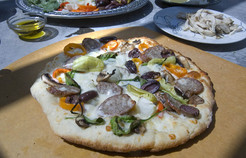 Paul Fraughton  |  The Salt Lake Tribune
A pizza cooked in Camp Chef's pizza oven.