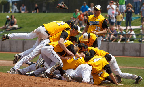 Trent Nelson  |  The Salt Lake Tribune
Emery players celebrate the win as Emery defeats Parowan for the 2A State High School Baseball Championship Saturday May 11, 2013 in Kearns.