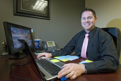 Paul Fraughton  |  The Salt Lake Tribune
Chris Bennett, a mortgage consultant at Axiom Financial.                          
 Wednesday, May 22, 2013