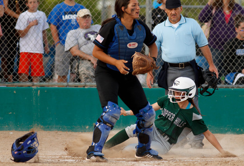 Trent Nelson  |  The Salt Lake Tribune
Copper Hills' Riley Cleverly scores as Copper Hills defeats Bingham High School in the 5A softball tournament in Taylorsville Wednesday May 22, 2013. Alta Academy.