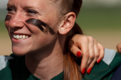Trent Nelson  |  The Salt Lake Tribune
Copper Hills' Suzi Sullivan in a huddle as Copper Hills defeats Bingham High School in the 5A softball tournament in Taylorsville Wednesday May 22, 2013. Alta Academy.