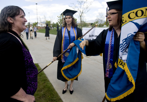 Kim Raff  |  The Salt Lake Tribune
(left) Darlene Head, Director of Veteran Services for SLCC, talks with (right) Karen Knewtson, a SLCC graduate and Army veteran, before the Salt Lake Community College Commencement Program outside the Maverik Center in West Valley City on May 9, 2013.