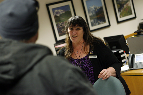 Francisco Kjolseth  |  The Salt Lake Tribune
Darlene Head, Director of the Salt Lake Community College Veteran's Center helps a Veteran with a question at the center on campus. Navigating the world of a college education following a tour of service can be stressful and overwhelming at times and Darlene and her staff do their best to get veterans pointed in the right direction.