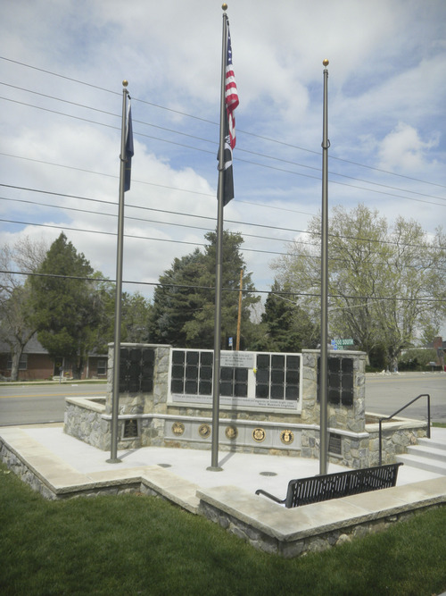 Tom Wharton  |  The Salt Lake Tribune
A small corner of the Farmington cemetery is dedicated to a veteran's memorial.