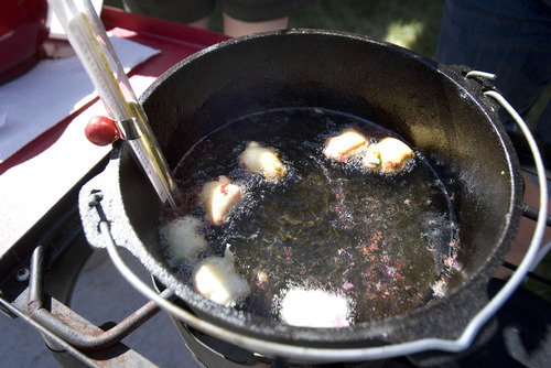 Paul Fraughton  |  The Salt Lake Tribune
Frosted animal crackers are deep fried at Riverview Jr. High School's ninth-grade Dutch oven cook-off.                         
 Friday, May 10, 2013
