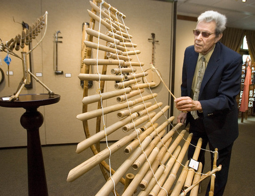Paul Fraughton  |  The Salt Lake Tribune
Dr. Lloyd Miller, an ethnomusicologist, taps on a traditional Vietnamese bamboo xylophone at the Utah Cultural Celebration Center. The center is hosting an exhibit highlighting the art, music and artifacts of Vietnam, as well as a photo exhibit of images from Vietnam by photographer John Steele.
