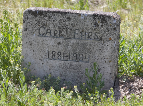 Paul Fraughton  |  The Salt Lake Tribune
One of the older headstones in the Bingham Cemetery.