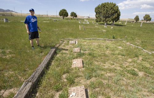 Paul Fraughton  |  The Salt Lake Tribune
Attorney Ron Yengich walks through the Bingham Cemetery where some of his relatives are buried.                            
 Thursday, May 9, 2013