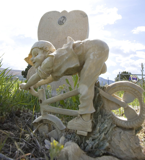 Paul Fraughton  |  The Salt Lake Tribune
A whimsical statue adorns the grave of a young boy in the Bingham Cemetery.  Thursday, May 9, 2013