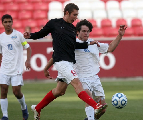 Kim Raff  |  The Salt Lake Tribune
Orem player (right) Danny Balser and (left) Bountiful player Tristan Booth compete for the ball during the 4A State Championship at Rio Tinto Stadium in Sandy on May 23, 2013. Bountiful went on to win the game 2-0.
