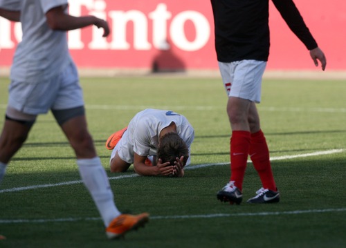 Kim Raff  |  The Salt Lake Tribune
Orem player Emil Cuello reacts to missing a shot on Bountiful's goal during the 4A State Championship at Rio Tinto Stadium in Sandy on May 23, 2013. Bountiful went on to win the game 2-0.