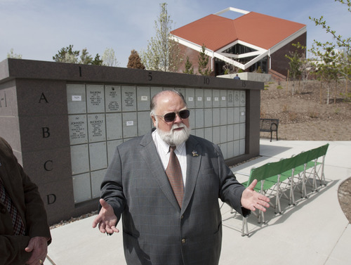 Steve Griffin | The Salt Lake Tribune


An outdoor Columbarium is part of the Utah Veterans Cemetery and Memorial Park's $5 million worth of improvements. Cremated ashes of veterans and their spouses are placed in the niches (recessed compartments) behind each name plate. Here Terry Schow, executive director of the Utah Department of Veterans Affairs, stands in front of one of the new Columbariums. Schow championed the project and is retiring at the end of June. The cemetery, located in Bluffdale, Utah was photographed Monday May 6, 2013.