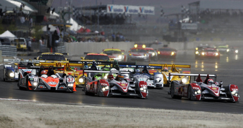 The field comes in to turn one at the start of the American Le Mans Series' Utah Grand Prix Sunday, May 18, 2008 at the Miller Motorsports Park. The racers ran their cars all out on the 3.048 miles course for two hours and 45 minutes at the Tooele facility. 5/18/2008 Jim Urquhart/The Salt Lake Tribune