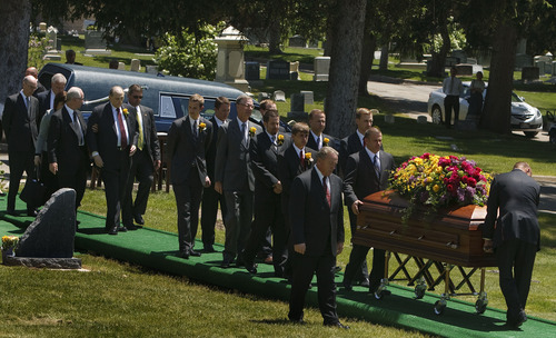 Leah Hogsten  |  The Salt Lake Tribune
LDS Church President Thomas S. Monson, family and friends are assisted to the gravesite of his wife, Frances J. Monson, who was laid to rest in the Salt Lake City Cemetery, Thursday, May 23, 2013. Frances Monson died Friday at age 85 after having been hospitalized for several weeks. The Utah-based Church of Jesus Christ of Latter-day Saints said she died of causes incident to age.