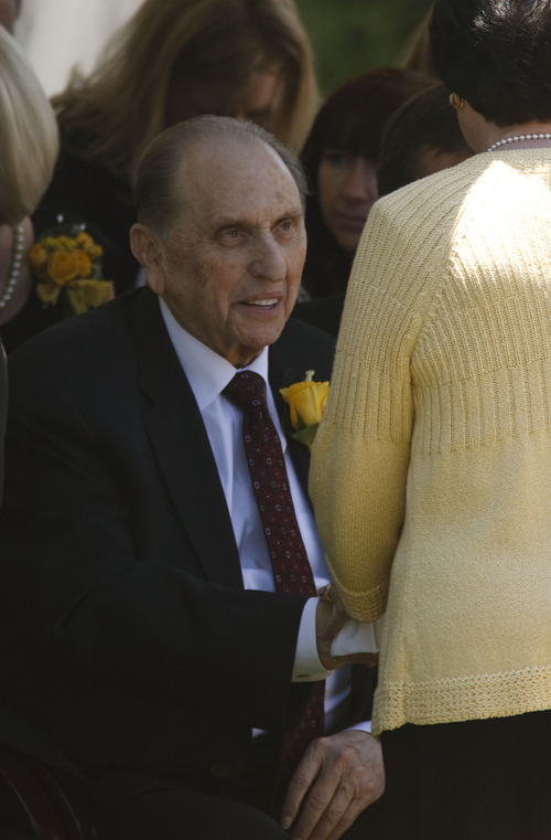 Leah Hogsten  |  The Salt Lake Tribune
LDS Church President Thomas S. Monson is greeted by a loved one at the gravesite of his wife, Frances J. Monson, who was laid to rest in the Salt Lake City Cemetery, Thursday, May 23, 2013. Frances Monson died Friday at age 85 after having been hospitalized for several weeks. The Utah-based Church of Jesus Christ of Latter-day Saints said she died of causes incident to age.