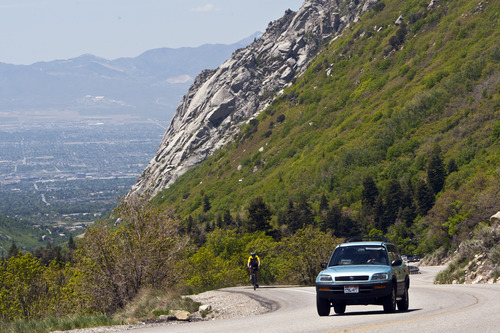 Chris Detrick  |  The Salt Lake Tribune
A cyclist bikes in Little Cottonwood Canyon Saturday May 25, 2013.
