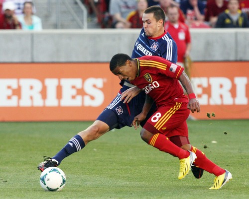 Kim Raff  |  The Salt Lake Tribune
(right) Real Salt Lake forward Joao Plata (8) tries to dribble past (left) Chicago Fire defender Austin Berry (22) during the first half of the match at Rio Tinto Stadium in Sandy on May 25, 2013.
