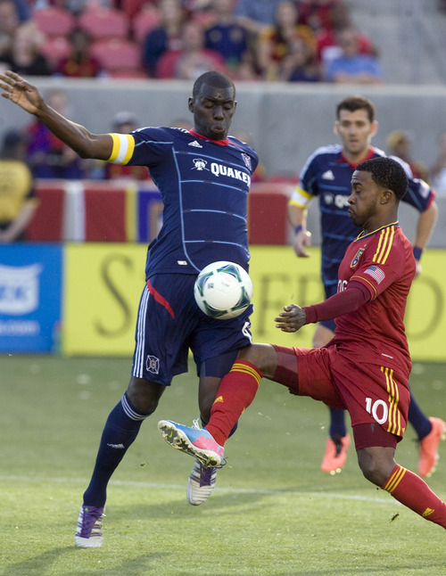 Kim Raff  |  The Salt Lake Tribune
(left) Chicago Fire defender Bakary Soumare (4) and (right) Real Salt Lake forward Robbie Findley (10) compete for a ball during the first half of the match at Rio Tinto Stadium in Sandy on May 25, 2013.