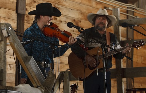 Leah Hogsten  |  The Salt Lake Tribune
Kylee Price and her accompanist Troy Roff entertain the crowd at the 8th Annual Cowboy Legends Cowboy Poetry and Music Festival, Saturday, May 25, 2013, celebrating the cowboy ranching history at the Fielding Garr Ranch on Antelope Island.