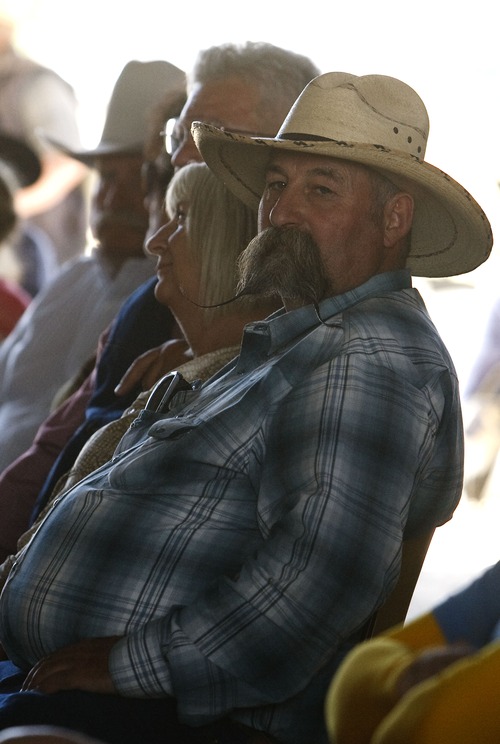 Leah Hogsten  |  The Salt Lake Tribune
"We come to this every year," said Kevin Higley of West Point of the 8th Annual Cowboy Legends Cowboy Poetry and Music Festival, Saturday, May 25, 2013, celebrating the cowboy ranching history at the Fielding Garr Ranch on Antelope Island.