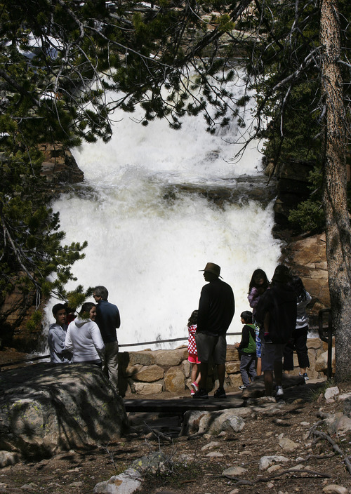 Scott Sommerdorf  |  The Salt Lake Tribune
Families visit the Provo River Falls just off the Mirror Lake Highway. The highway -- State Road 150 -- is now open just in time for the Memorial Day weekend, Sunday, May 26, 2013.
