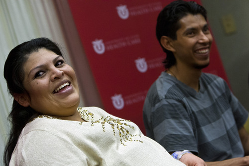 Chris Detrick  |  The Salt Lake Tribune
Guillermina and Fernando Garcia laugh during a press conference at the University of Utah Hospital Tuesday May 28, 2013. The couple welcomed quintuplets to the world on Sunday. Their names, in the order of their birth, are: Esmeralda, Fatima, Fernando, Marissa, Jordan.