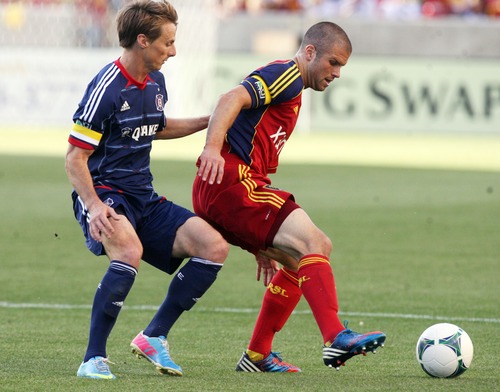 Kim Raff  |  The Salt Lake Tribune
(right) Real Salt Lake defender Chris Wingert (17) tries to maintain control of the ball as (left) Chicago Fire forward Chris Rolfe (17) defends during the first half of the match at Rio Tinto Stadium in Sandy on May 25, 2013.