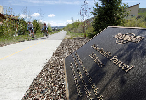 Al Hartmann  |  The Salt Lake Tribune
Bicycle riders takes some excercise along Park City's Union Pacific trail near Bonanza Drive Tuesday May 21. Dozens of lead and arsenic samples along rails-to-trails routes, including the Denver & Rio Grande Trailhead along the Great Salt Lake and the Historic Union Pacific Trail in Park City, are up to 15 times higher than safe levels.