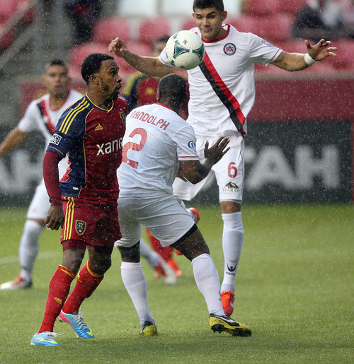 Steve Griffin | The Salt Lake Tribune


Real's Robbie Findley looks to head the ball as rain falls during the Real Salt Lake versus Atlanta soccer game at Rio Tinto Stadium in Sandy, Utah Tuesday May 28, 2013.