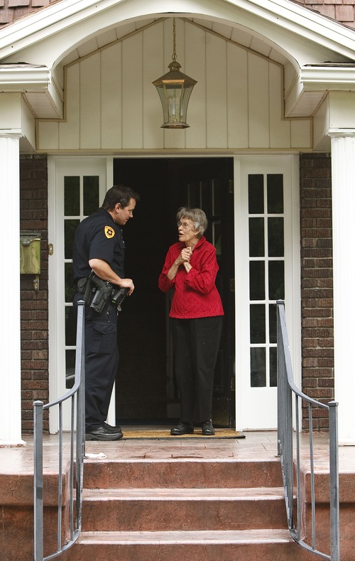 Leah Hogsten  |  The Salt Lake Tribune
Salt Lake City Police detective Andy Leonard chats with Marilyn Lundgreen in the Liberty Wells neighborhood about the recent burglaries in the area, Wednesday, May 29, 2013.