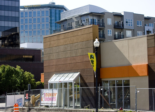 Kim Raff  |  The Salt Lake Tribune
Construction on Utah's first Dunkin' Donuts is close to completion on the site of a former Burger King, across from the Salt Lake City Main Library. The store is set to open June 25.