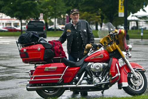 Chris Detrick  |  The Salt Lake Tribune
Ralph "Teach" Elrod poses with his Harley-Davidson 2003 Firefighter Special Edition outside the Salt Lake City Public Library on Tuesday. Elrod wrote the book "Kick Start: Memories of an Outlaw Biker."