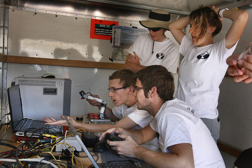 Scott Sommerdorf   |  The Salt Lake Tribune
The BYU control team is shocked to see that the arm of their rover has fallen off while navigating the "Sample Return Task" at the University Rover Challenge held roughly six miles outside of Hanksville, Friday May 31, 2013.