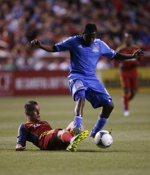 Francisco Kjolseth  |  The Salt Lake Tribune
Real Salt Lake's Luis Gil tries to slide in for the ball against Marvin Chavez of the San Jose Earthquakes on Saturday, June 1, 2013 at Rio Tinto Stadium in Sandy.
