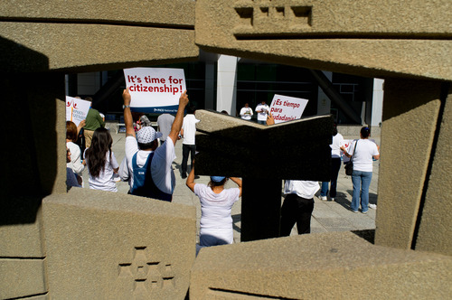 Trent Nelson  |  The Salt Lake Tribune
Attendees hold signs at a prayer vigil for immigration reform at the Federal Building in Salt Lake City Thursday May 30, 2013.