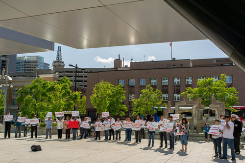 Trent Nelson  |  The Salt Lake Tribune
Attendees hold signs at a prayer vigil for immigration reform at the Federal Building in Salt Lake City Thursday May 30, 2013.