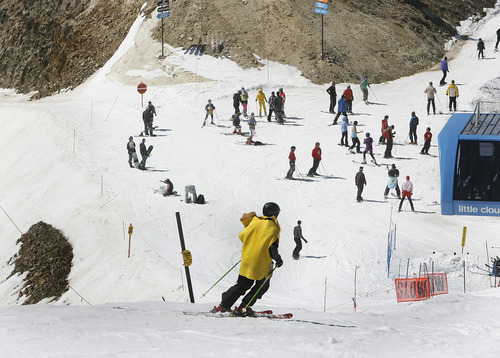 Scott Sommerdorf   |  The Salt Lake Tribune
Skiers just off the tram, head out on the last day of skiing at Snowbird Resort, Monday May 27, 2013.