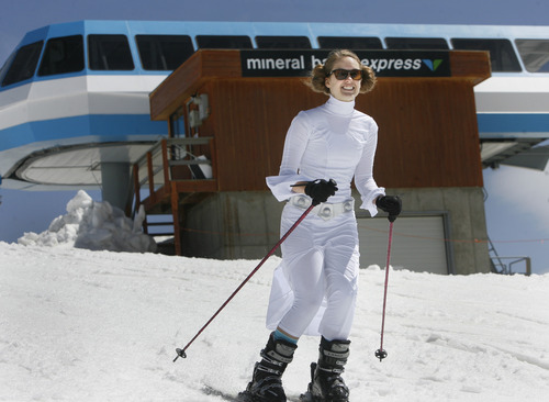 Scott Sommerdorf   |  The Salt Lake Tribune
A skier dressed as "Princess Leia" takes off after getting off the tram on the last day of skiing at Snowbird Resort, Monday May 27, 2013.