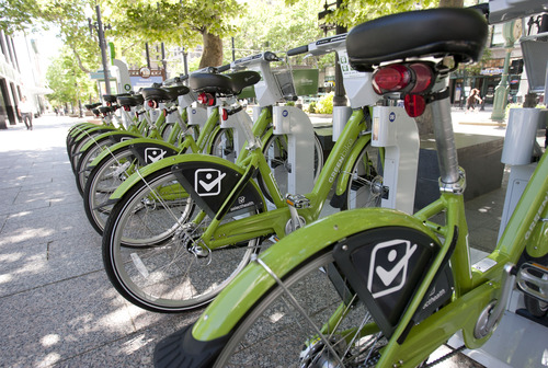 Steve Griffin | The Salt Lake Tribune
GREENbike, Salt Lake City's bike-share program, has been wildly successful in its first six weeks. Here bikes are ready to go at the Gallivan Center on Monday June 3, 2013.