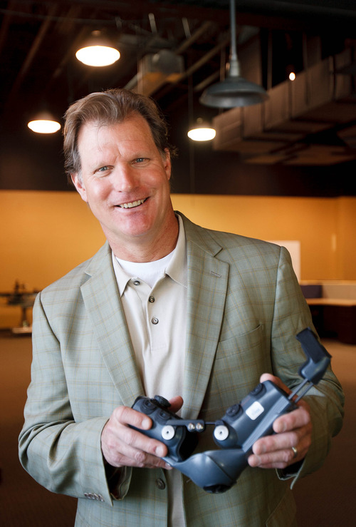 Trent Nelson  |  The Salt Lake Tribune
Kurt Vedder, President and CEO of Fixes 4 Kids, with one of his companies products in Salt Lake City Friday May 31, 2013. Fixes 4 Kids is a new Utah company that is building a new fixture, the E-Fix, for pediatric orthopedic surgeons that helps them fix a child's arm when it's broken.