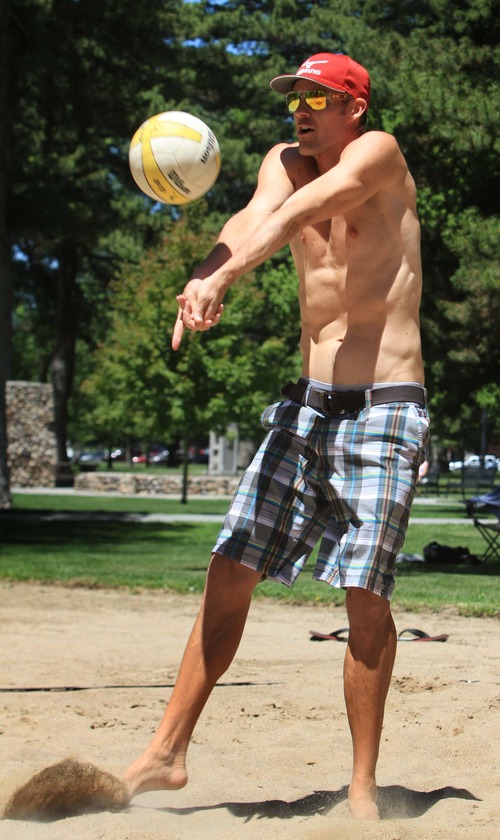 Rick Egan  | The Salt Lake Tribune 

Utah native and two-time Olympian Jake Gibb plays volleyball at Liberty Park, Wednesday, June 5, 2013. Gibb is promoting the AVP Pro Beach Volleyball Tour coming to Utah in August.