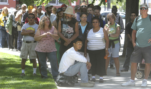 Keith Johnson | The Salt Lake Tribune

People line up at Pioneer Park in Salt Lake City to have a meal provided by Subway during "Day of Giving" June 5, 2013. Subway served over 1,100 meals as well as donated $10,000 to the Rescue Mission of Salt Lake.