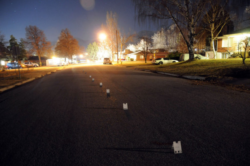 Investigation photos

Evidence markers form a line down the middle of the street outside Matthew David Stewart's house in Ogden after a shoot out with police on January 4, 2012.