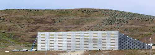 Ground lever view of Utah's NSA Data Center in Bluffdale, Utah, Friday, June 7, 2013. President Barack Obama vigorously defended sweeping secret surveillance into America's phone records and foreigners' Internet use, declaring "we have to make choices as a society." It was revealed late Wednesday that the National Security Agency has been collecting the phone records of hundreds of millions of U.S. phone customers.  (AP Photo/Rick Bowmer)