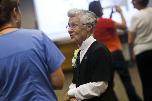 Chris Detrick  |  The Salt Lake Tribune
Sister Danile Knight talks with friends during an open house-farewell for the Sisters of St. Benedict at Ogden Regional Medical Center on Tuesday, June 4, 2013. The sisters are returning to St. Benedict's Monastery in St. Joseph, Minn., to continue with their lives of service. "We leave with no regrets," said Sister Stephanie Mongeon. "We leave our peace and gratitude with the people of this community." Sister Knight has been serving since 1964.
