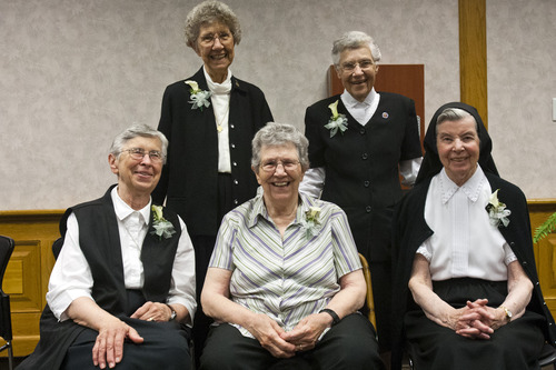 Chris Detrick  |  The Salt Lake Tribune
(L-R) Sisters Mary Zenzen, Stephanie Mongeon, Jean Gibson, Danile Knight and Luke Hoschette pose for a portrait during an open house-farewell for the Sisters of St. Benedict at Ogden Regional Medical Center on Tuesday, June 4, 2013. The sisters are returning to St. Benedict's Monastery in St. Joseph, Minn., to continue with their lives of service. "We leave with no regrets," said Sister Stephanie Mongeon. "We leave our peace and gratitude with the people of this community."